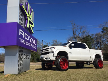 Red powder coated wheels installed on truck Longview, TX